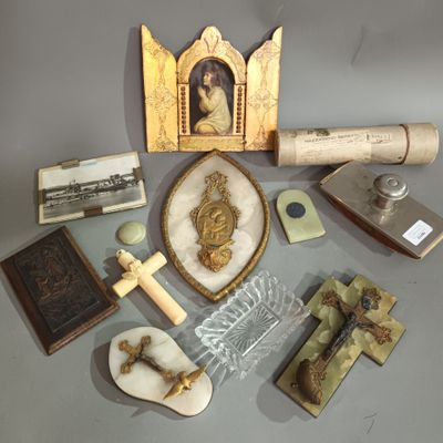 a collection of religious items displayed on a table