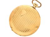 a gold pocket watch on a white background