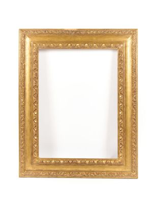 an antique gold frame with a white background
