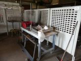 an image of a workbench in a garage with tools