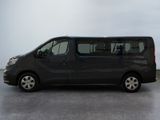 a black van that is parked in a parking lot