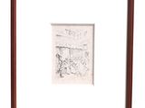drawing of a street scene in a frame with a man sitting at a table