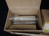 a box of toothbrushes and a box of toothpaste