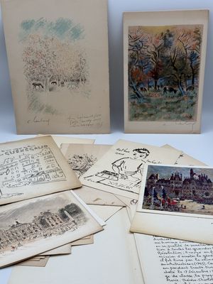 an assortment of old books and drawings on a white surface