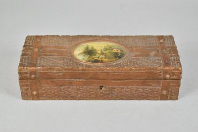 a small wooden box with a painting on it