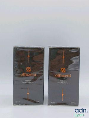 two boxes of chocolate flavored chocolate sitting next to each other