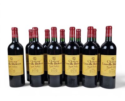 six bottles of red wine are lined up in a row