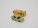 an image of a green toy car next to a yellow box