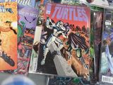 a lot of comic books on the table