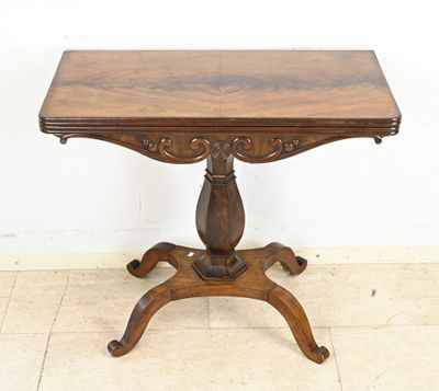 an image of a small table with a wooden top on a tile floor