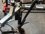a machine that is sitting on the floor in the garage
