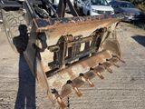 a bulldozer that is sitting in the dirt