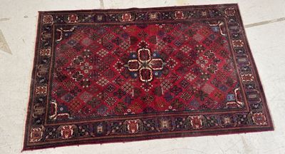 a rug on the floor with a cross on it