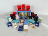 an image of a pile of different types of perfumes