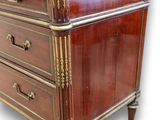 an image of a wooden chest of drawers with a marble top