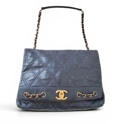 a chanel blue quilted leather shoulder bag with gold hardware