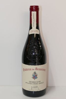 a bottle of wine that is sitting on a table