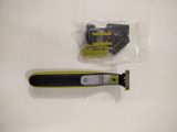 a yellow and black electric razor and a black and white razor