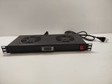 a close up of a computer power supply on a white surface