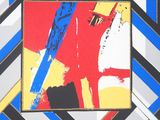painting of a red, yellow, blue, and black abstract painting on a wall