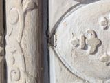 a close up of a door with a clock on it