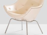 an image of a white chair with a metal frame and a leather seat