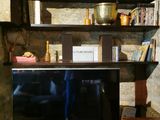 a tv that is sitting on a table in a room
