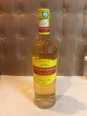 a bottle of liquor sitting on a table