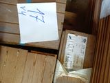 a piece of paper taped to a piece of wood