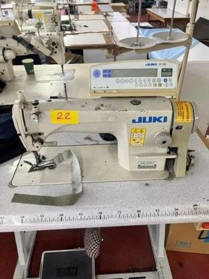 an image of a sewing machine sitting on top of a table