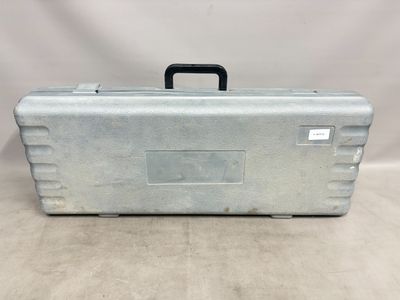 a metal case with a handle and handle on top of it