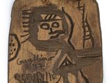 carved wooden plaque with a drawing of a man holding a knife