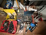 a lot of tools that are sitting on the floor