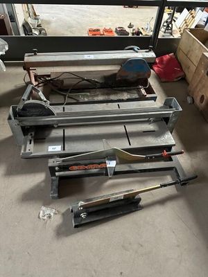 a lot of tools that are sitting on the floor