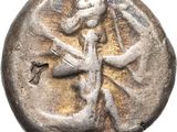 a close up of a coin with an image of a woman on it
