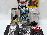 a lot of comic books that are on the table