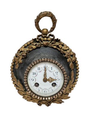 Petite PENDULE d'applique en tôle laquée noire avec légère o…