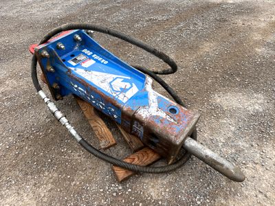 an image of a blue jacket laying on the ground