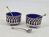 pair of silver and blue glass salt and pepper shakers