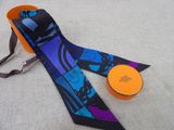 purple and blue neck tie with orange and black design on it