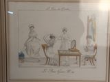 a picture of a drawing of a woman sitting at a table