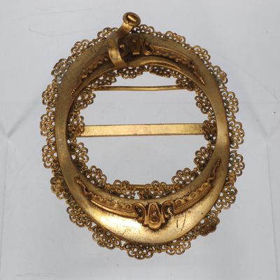 Boucle de ceinture en laiton de forme ovale à vue intérieure…