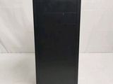 a black desktop computer sitting on top of a white surface