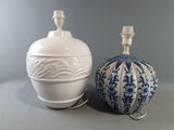 two vases sitting next to each other on a table
