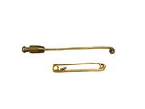 pair of brass safety pins on a white background