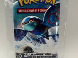 a close up of a bag of pokemon trading cards on a table