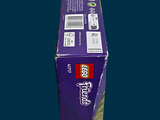 a purple box of toothpaste on a blue background