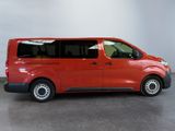 an image of a red van parked in a garage