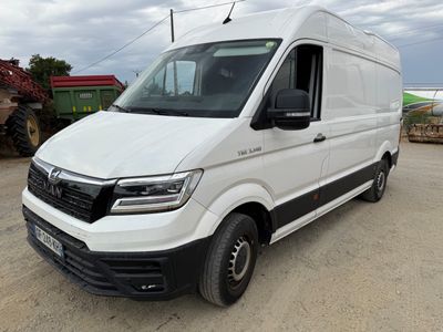 a picture of a white van parked in a lot