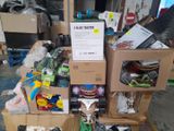 a pile of boxes and other items in a room